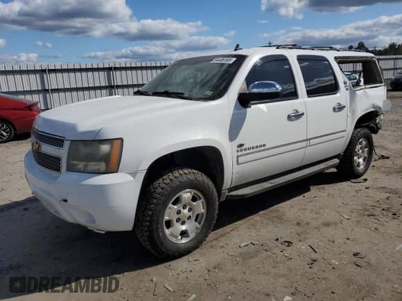 2011 Chevrolet Suburban LTZ with VIN 1GNSKKE3XBR375496, listed as a Copart auction lot 84406185 with 254,418 mi miles and Salvage title. Bid and sale history available at DreamBid. Image 1.
