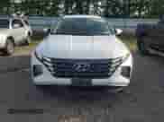 2022 Hyundai Tucson Blue with VIN KM8JBCA11NU066804, listed as a Copart auction lot 80804165 with 80,081 mi miles and Salvage title. Bid and sale history available at DreamBid. Image 5.