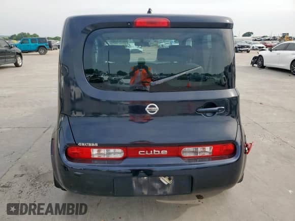 2010 Nissan Cube SL с VIN JN8AZ2KR5AT164575, выставлен на аукционе Copart как лот 57141735 с пробегом 108 029 миль миль и Чистый • Clean title. История ставок и продаж доступна на DreamBid. Изображение 6.