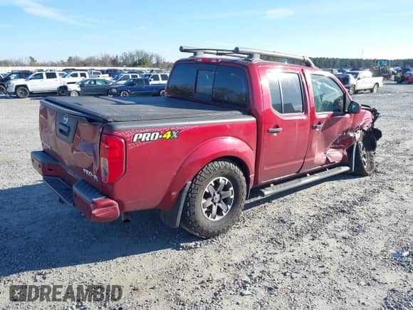 2020 Nissan Frontier Pro-4X with VIN 1N6ED0EB7LN711929, listed as a IAAI auction lot 41734195 with 145,089 mi miles and . Bid and sale history available at DreamBid. Image 4.