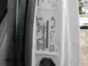 2003 Ford Econoline Cargo z VIN 1FTRE14263HB60156, wystawiony jako Copart lot #85138954 z przebiegiem 202 624 mil mil oraz Czysty tytuł • Clean title. Historia ofert i sprzedaży dostępna na DreamBid. Obrazek 12.