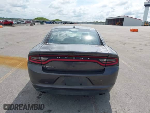 2020 Dodge Charger Police z VIN 2C3CDXKT4LH120180, wystawiony jako IAAI lot #42834441 z przebiegiem 128 459 mil mil oraz . Historia ofert i sprzedaży dostępna na DreamBid. Obrazek 17.