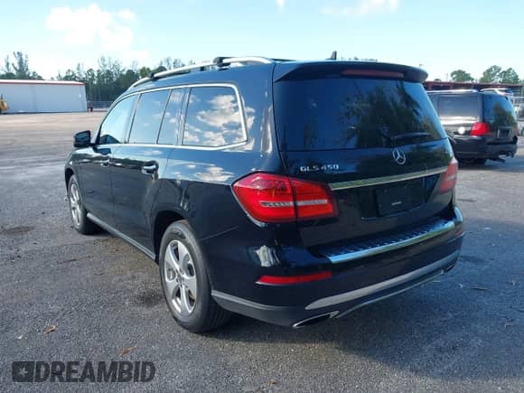 2018 Mercedes-Benz GLS 450 with VIN 4JGDF6EE3JB129875, listed as a IAAI auction lot 43532640 with 188,627 mi miles and . Bid and sale history available at DreamBid. Image 3.