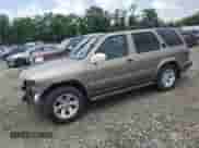 2003 Nissan Pathfinder LE with VIN JN8DR09Y93W800267, listed as a Copart auction lot 62574235 with 203,018 mi miles and Salvage title. Bid and sale history available at DreamBid. Image 1.