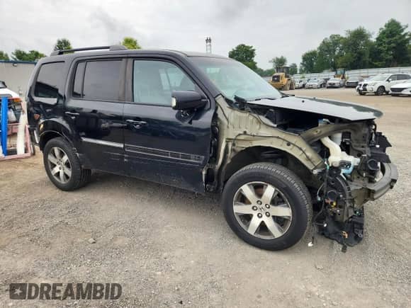 2013 Honda Pilot Touring with VIN 5FNYF4H96DB080424, listed as a Copart auction lot 67986745 with 157,675 mi miles and Salvage title. Bid and sale history available at DreamBid. Image 4.