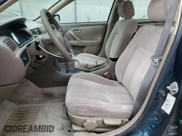 1997 Toyota Camry LE с VIN 4T1BG22K2VU069055, выставлен на аукционе Copart как лот 80131065 с пробегом 193 934 миль миль и Списание • Salvage title. История ставок и продаж доступна на DreamBid. Изображение 7.