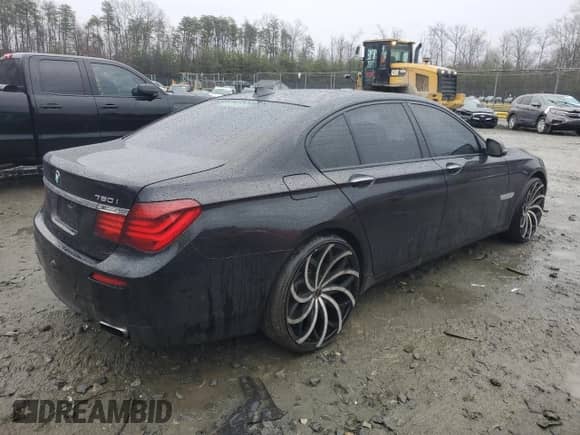 2013 BMW 7 Series 750i xDrive with VIN WBAYB6C58DD223681, listed as a Copart auction lot 50156875 with 139,422 mi miles and Salvage title. Bid and sale history available at DreamBid. Image 3.