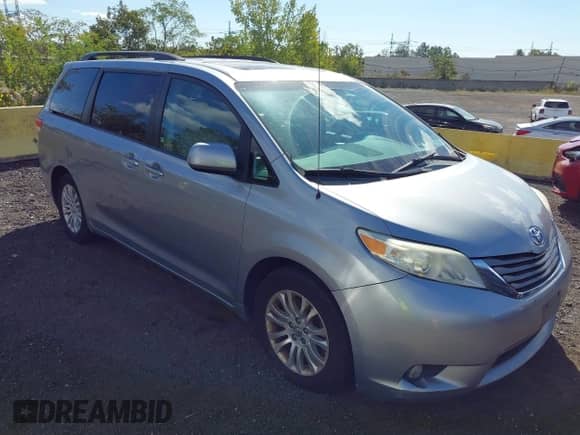 2012 Toyota Sienna XLE with VIN 5TDYK3DCXCS235154, listed as a IAAI auction lot 43366877 with 216,434 mi miles and . Bid and sale history available at DreamBid. Image 1.