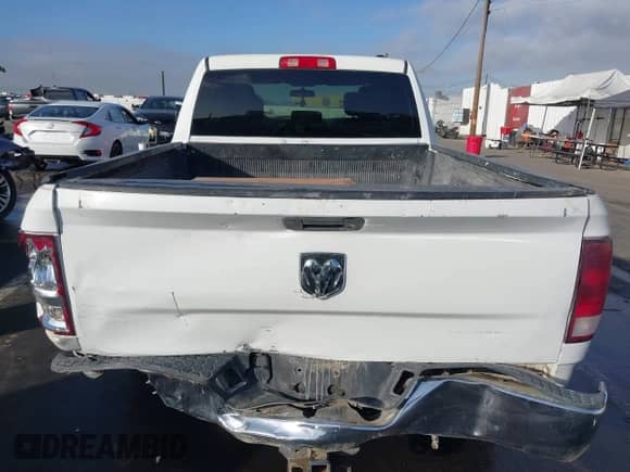 2012 Ram 1500 Tradesman z VIN 1C6RD6FP8CS231893, wystawiony jako IAAI lot #41097504 z przebiegiem 131 717 mil mil oraz . Historia ofert i sprzedaży dostępna na DreamBid. Obrazek 16.