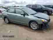 2014 Subaru Impreza Premium with VIN JF1GJAC69EH021218, listed as a Copart auction lot 69116255 with 50,899 mi miles and Salvage title. Bid and sale history available at DreamBid. Image 4.