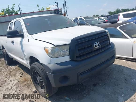 2012 Toyota Tundra z VIN 5TFRU5F18CX026656, wystawiony jako IAAI lot #42949363 z przebiegiem 294 338 mil mil oraz . Historia ofert i sprzedaży dostępna na DreamBid. Obrazek 1.