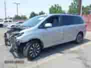 2019 Toyota Sienna LE with VIN 5TDJZ3DC5KS225000, listed as a IAAI auction lot 42414072 with 77,365 mi miles and . Bid and sale history available at DreamBid. Image 2.