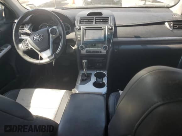 2014 Toyota Camry LE с VIN 4T1BF1FKXEU755951, выставлен на аукционе Copart как лот 64700355 с пробегом 162 254 миль миль и Списание • Salvage title. История ставок и продаж доступна на DreamBid. Изображение 8.