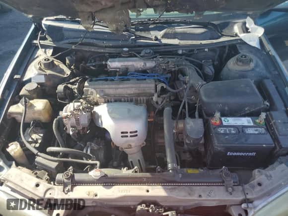 1997 Toyota Camry LE z VIN JT2BG22K0V0003351, wystawiony jako Copart lot #68922285 z przebiegiem 233 760 mil mil oraz Szkoda całkowita • Salvage title. Historia ofert i sprzedaży dostępna na DreamBid. Obrazek 11.