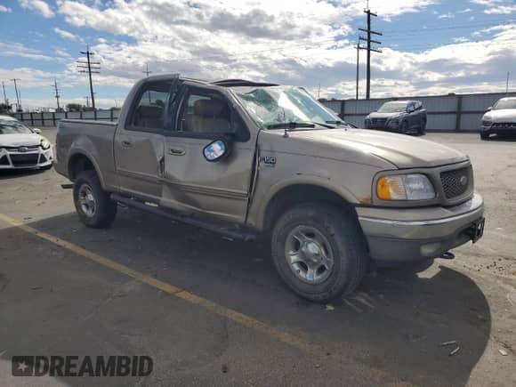 2003 Ford F-150 XLT with VIN 1FTRW08L93KB25558, listed as a Copart auction lot 81910345 with 169,885 mi miles and Salvage title. Bid and sale history available at DreamBid. Image 4.
