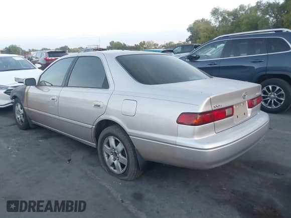 1997 Toyota Camry LE z VIN 4T1BG22KXVU787551, wystawiony jako IAAI lot #43189429 z przebiegiem Nie podano mil oraz . Historia ofert i sprzedaży dostępna na DreamBid. Obrazek 3.