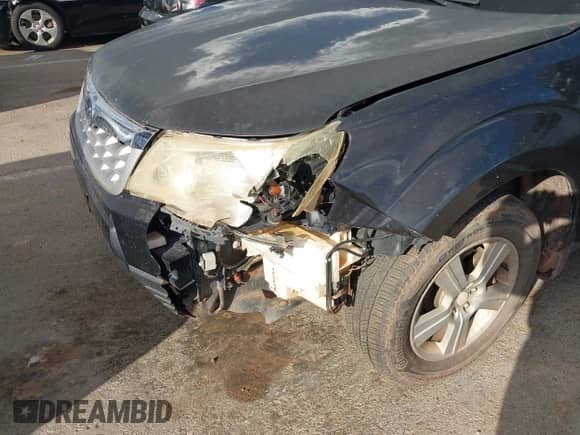 2011 Subaru Forester X with VIN JF2SHBBC5BH782192, listed as a IAAI auction lot 43385948 with 167,040 mi miles and . Bid and sale history available at DreamBid. Image 6.