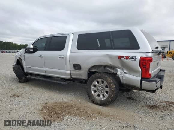 2017 Ford F-250 Lariat with VIN 1FT7W2BT2HED99010, listed as a Copart auction lot 69380955 with 147,941 mi miles and Salvage title. Bid and sale history available at DreamBid. Image 2.