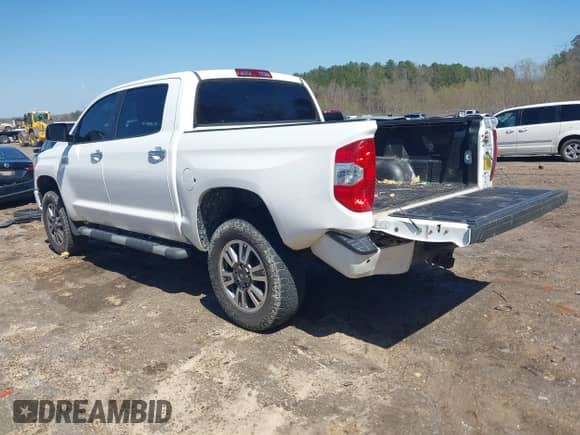 2019 Toyota Tundra SR5 with VIN 5TFAY5F14KX803995, listed as a IAAI auction lot 41720938 with 151,411 mi miles and . Bid and sale history available at DreamBid. Image 3.