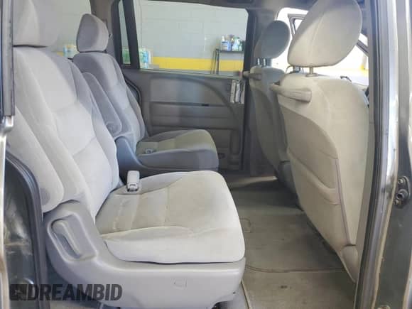 2009 Honda Odyssey LX с VIN 5FNRL38219B055819, выставлен на аукционе Copart как лот 71858535 с пробегом 211 476 миль миль и Списание • Salvage title. История ставок и продаж доступна на DreamBid. Изображение 11.