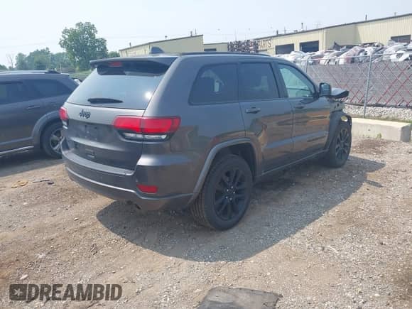 2019 Jeep Grand Cherokee Altitude with VIN 1C4RJFAG5KC601781, listed as a IAAI auction lot 42727617 with 72,702 mi miles and . Bid and sale history available at DreamBid. Image 4.