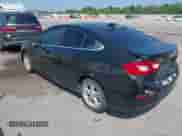 2016 Chevrolet Cruze LT z VIN 1G1BE5SM1G7253264, wystawiony jako IAAI lot #43042095 z przebiegiem 99 417 mil mil oraz . Historia ofert i sprzedaży dostępna na DreamBid. Obrazek 3.