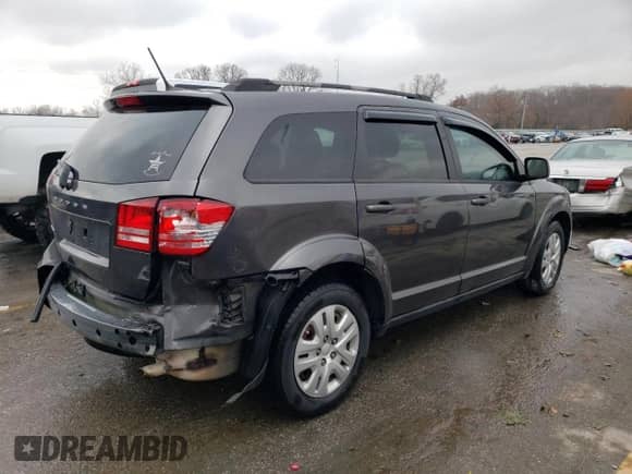 2018 Dodge Journey SE с VIN 3C4PDCAB1JT319657, выставлен на аукционе Copart как лот 76963503 с пробегом 90 154 миль миль и Списание • Salvage title. История ставок и продаж доступна на DreamBid. Изображение 3.
