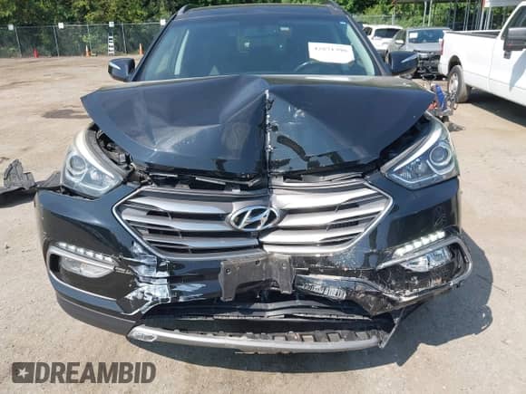2017 Hyundai Santa Fe Ultimate with VIN 5NMZW4LA6HH047532, listed as a IAAI auction lot 42871398 with 26,910 mi miles and . Bid and sale history available at DreamBid. Image 6.