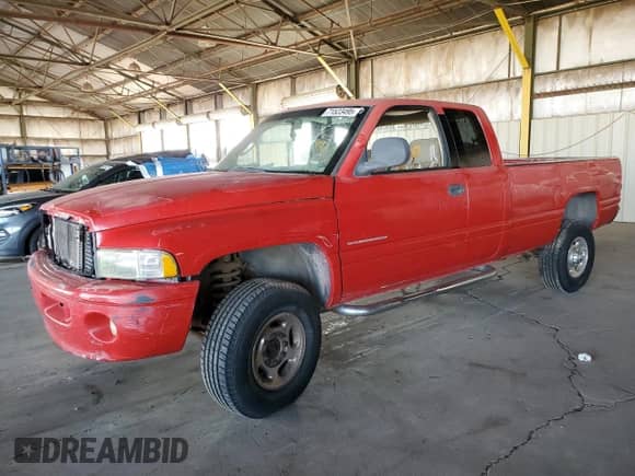 2001 Dodge 2500 with VIN 1B7KF237X1J250840, listed as a Copart auction lot 71523495 with 366,573 mi miles and Salvage title. Bid and sale history available at DreamBid. Image 1.