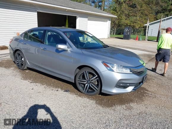 2017 Honda Accord Touring with VIN 1HGCR3F91HA041612, listed as a IAAI auction lot 43436214 with 98,518 mi miles and . Bid and sale history available at DreamBid. Image 1.