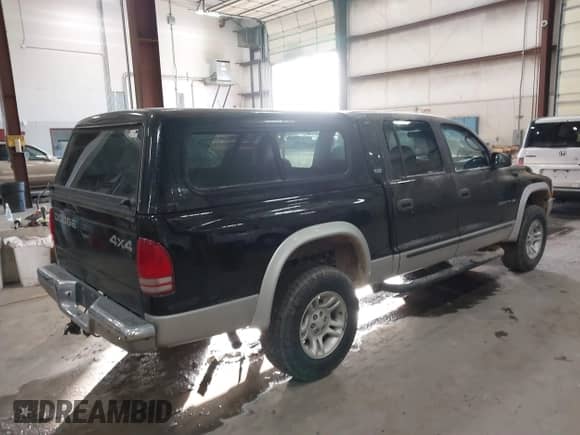 2001 Dodge Dakota with VIN 1B7GG2AX61S202929, listed as a IAAI auction lot 41381068 with 107,561 mi miles and . Bid and sale history available at DreamBid. Image 4.