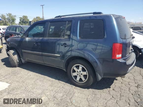 2009 Honda Pilot Touring with VIN 5FNYF488X9B041284, listed as a Copart auction lot 64602555 with 273,147 mi miles and Salvage title. Bid and sale history available at DreamBid. Image 2.