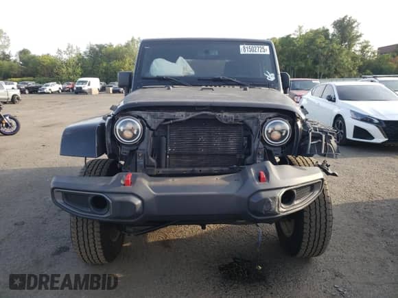 2014 Jeep Wrangler Sahara с VIN 1C4AJWBG0EL125620, выставлен на аукционе Copart как лот 81502725 с пробегом 143 297 миль миль и Списание • Salvage title. История ставок и продаж доступна на DreamBid. Изображение 5.