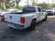 2005 Dodge Dakota SLT with VIN 1D7HW48N95S287753, listed as a IAAI auction lot 42806103 with 166,000 mi miles and . Bid and sale history available at DreamBid. Image 4.