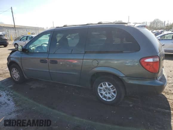 2004 Dodge Caravan SE with VIN 1D4GP24R04B520727, listed as a Copart auction lot 52002475 with 164,954 mi miles and Salvage title. Bid and sale history available at DreamBid. Image 2.