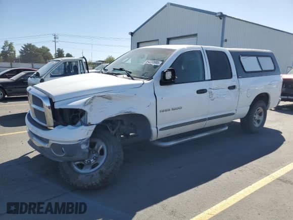 2002 Dodge RAM z VIN 3D3HU18ZX2G184093, wystawiony jako Copart lot #64220995 z przebiegiem 152 751 mil mil oraz Szkoda całkowita • Salvage title. Historia ofert i sprzedaży dostępna na DreamBid. Obrazek 1.