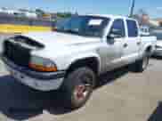 2001 Dodge Dakota Sport with VIN 1B7HG2ANX1S296588, listed as a IAAI auction lot 42849342 with Not provided miles and . Bid and sale history available at DreamBid. Image 2.