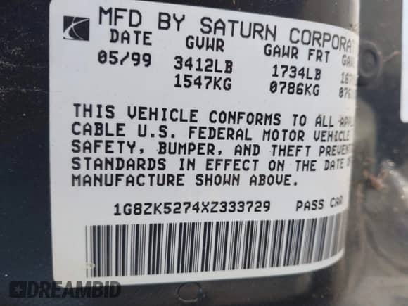 1999 Saturn SL z VIN 1G8ZK5274XZ333729, wystawiony jako IAAI lot #41987885 z przebiegiem Nie podano mil oraz . Historia ofert i sprzedaży dostępna na DreamBid. Obrazek 9.