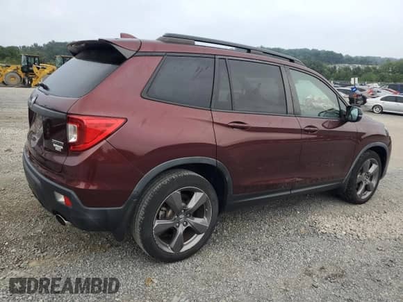 2019 Honda Passport Touring with VIN 5FNYF7H92KB000356, listed as a Copart auction lot 69598615 with 27,658 mi miles and Salvage title. Bid and sale history available at DreamBid. Image 3.