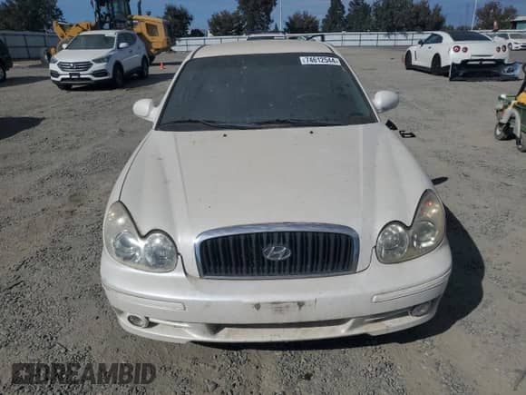 2004 Hyundai Sonata z VIN KMHWF25S84A994567, wystawiony jako Copart lot #74612544 z przebiegiem 158 186 mil mil oraz Czysty tytuł • Clean title. Historia ofert i sprzedaży dostępna na DreamBid. Obrazek 5.