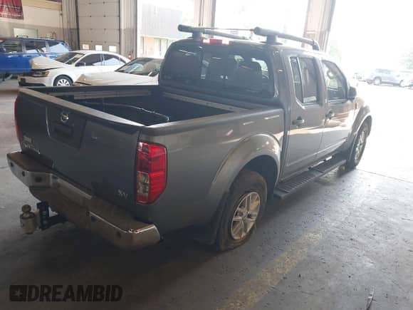2020 Nissan Frontier SV with VIN 1N6ED0EAXLN707963, listed as a IAAI auction lot 43154106 with 54,141 mi miles and . Bid and sale history available at DreamBid. Image 4.