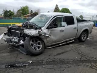 2014 Ram 1500 Laramie z VIN 1C6RR7NM4ES430439, wystawiony jako Copart lot #58587125 z przebiegiem Nie podano mil oraz Szkoda całkowita • Salvage title. Historia ofert i sprzedaży dostępna na DreamBid. Obrazek 1.