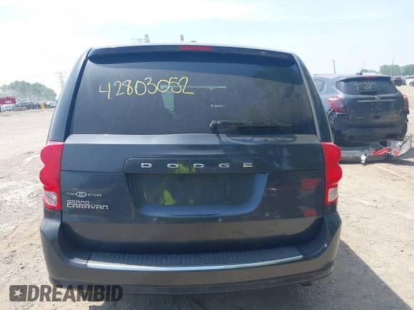 2014 Dodge Grand Caravan SE with VIN 2C4RDGBG7ER227469, listed as a IAAI auction lot 42803052 with 198,301 mi miles and . Bid and sale history available at DreamBid. Image 16.