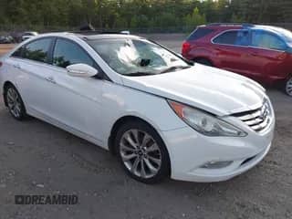 2012 Hyundai Sonata SE z VIN 5NPEC4ABXCH469141, wystawiony jako IAAI lot #42788098 z przebiegiem 104 642 mil mil oraz . Historia ofert i sprzedaży dostępna na DreamBid. Obrazek 1.