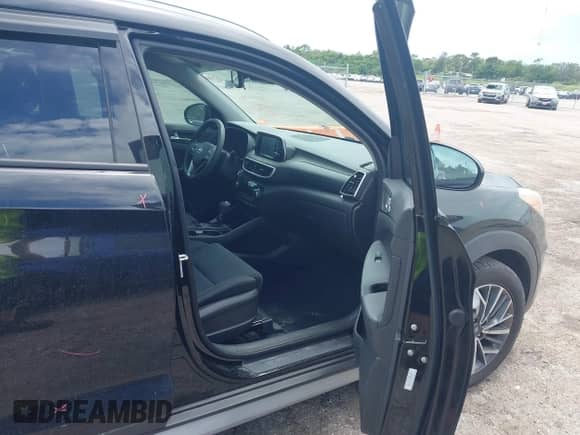 2019 Hyundai Tucson SEL with VIN KM8J33AL7KU056577, listed as a IAAI auction lot 42633491 with 94,274 mi miles and . Bid and sale history available at DreamBid. Image 5.