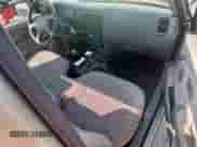 2002 Toyota Tacoma с VIN 5TENL42N52Z144191, выставлен на аукционе Copart как лот 83793165 с пробегом 151 018 миль миль и Чистый • Clean title. История ставок и продаж доступна на DreamBid. Изображение 8.