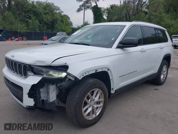 2023 Jeep Grand Cherokee Altitude with VIN 1C4RJKAG4P8886850, listed as a IAAI auction lot 43061874 with 59,852 mi miles and . Bid and sale history available at DreamBid. Image 2.