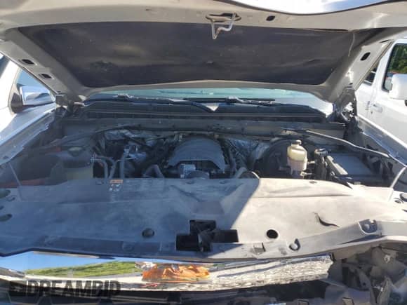 2016 Chevrolet Silverado 1500 Work Truck with VIN 1GCNKNEC1GZ381427, listed as a Copart auction lot 69613144 with 107,131 mi miles and Salvage title. Bid and sale history available at DreamBid. Image 12.