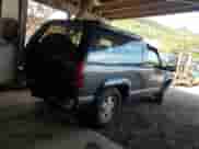 1993 Chevrolet Blazer z VIN 1GNEK18K8PJ350614, wystawiony jako Copart lot #84088954 z przebiegiem 247 946 mil mil oraz Szkoda całkowita • Salvage title. Historia ofert i sprzedaży dostępna na DreamBid. Obrazek 3.