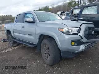 2020 Toyota Tacoma SR5 with VIN 3TMCZ5AN3LM318125, listed as a IAAI auction lot 41853234 with 69,328 mi miles and . Bid and sale history available at DreamBid. Image 1.